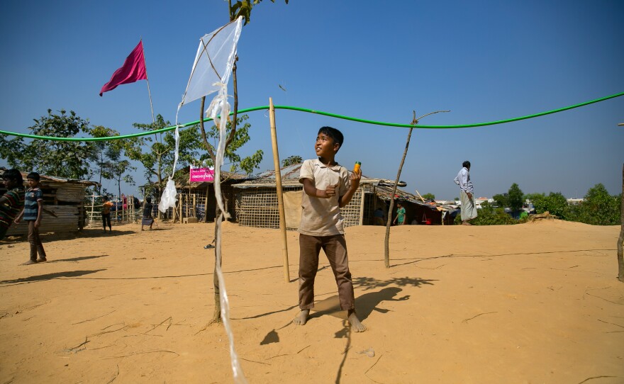 Khamal uses discarded pieces of bamboo and plastic to make his kites. Once the toy is in the air, he says he can feel through the string if it's a success or not. If it's bad, he immediately throws it away.