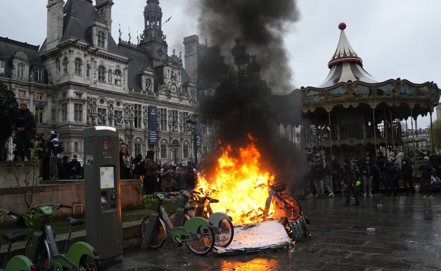 Bicycles burn during a protest outside the Paris City Hall on Friday, the day France's Constitutional Council approved an unpopular plan to raise the retirement age from 62 to 64.