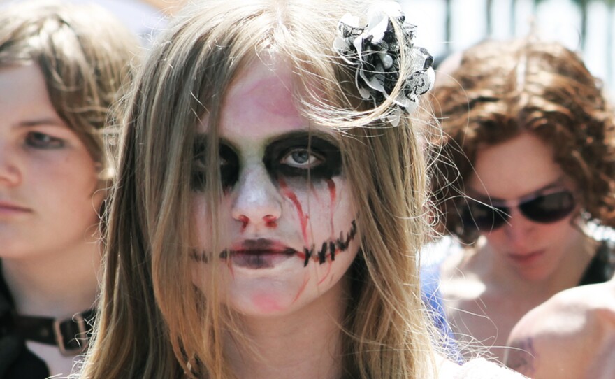 A zombie bride waits in line to get her pass for Comic-Con, International.