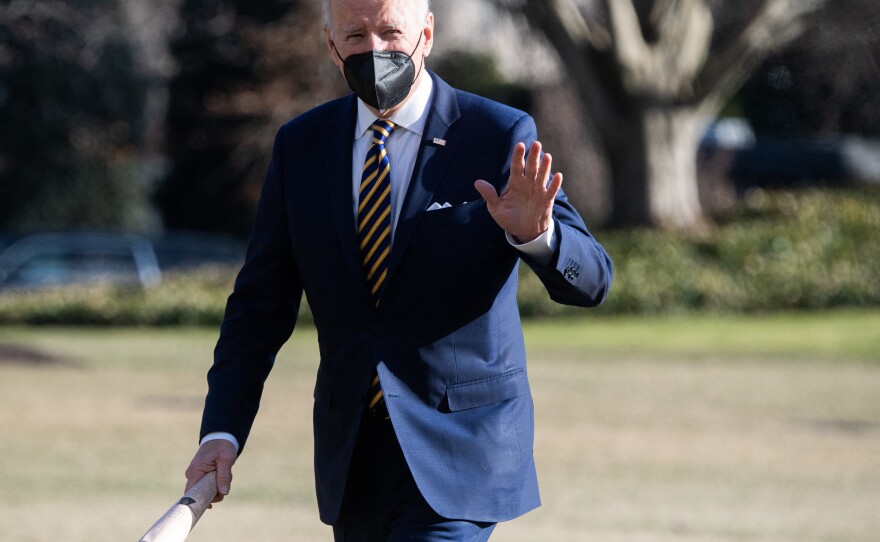 President Joe Biden walks across the South Lawn at the White House shortly before meeting with Democratic senators on the Senate Judiciary Committee about the Supreme Court vacancy.