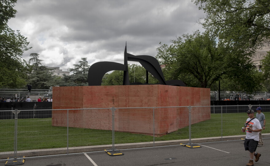 A sculpture by Alexander Calder is barricaded at the entrance to the National Gallery of Art during the Freedom 250 Grand Prix on Aug. 22, 2026.