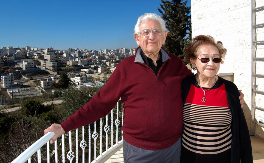 Elyakim Haetzni, who fled Hitler's Germany, now lives with his wife Tzipora in the West Bank settlement Kiryat Arba. The almost entirely Palestinian city of Hebron is in the background.