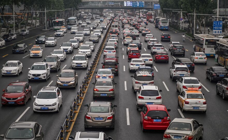 The city of Wuhan, where the coronavirus first began to spread, is pictured on May 14. Many Chinese cities have seen rush hour traffic return to pre-pandemic levels — or worse — after reopening, according to traffic data company TomTom. Cities around the world are trying to figure out how to avoid disastrous gridlock as residents resume travel while avoiding public transit.