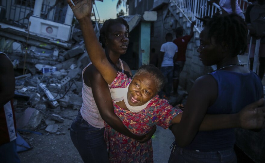 <strong>Sat., Aug. 14</strong>: Oxiliene Morency cries out in grief after the body of her 7-year-old-daughter Esther Daniel was recovered from the rubble of their home destroyed by the earthquake in Les Cayes, Haiti.