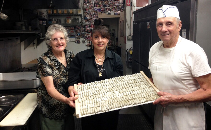 Mary Cittoni, Joanne Cittoni Gonzalez and Clemente Cittoni work together, making malfatti in the kitchen of Val's Liquor in Napa.