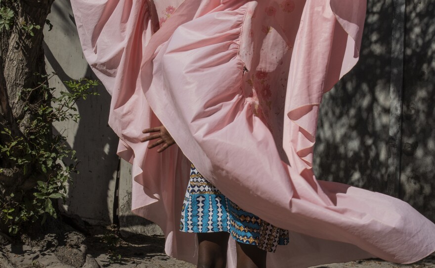 Zipporah playing with the laundry. 2022.