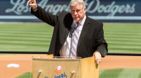 Former Los Angeles Dodgers pitcher Tommy John praises his late friend, Dr. Frank Jobe, during a 2014 memorial service at Dodger Stadium in Los Angeles.
