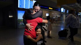 Emely, left, is reunited with her mother, Glenda Valdez and sister, Zuri, at Austin-Bergstrom International Airport, Sunday, June 6, 2021, in Austin, Texas. 