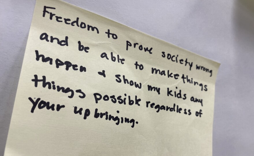 A sticky note with an observation from a community member that attended an informational meeting about guaranteed income hosted by Pollard, Dec. 1, 2021. It reads: "Freedom to prove society wrong and be able to make things happen and show my kids anything's possible regardless of your upbringing." 