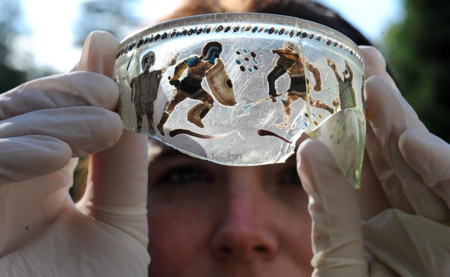 A fragment of Roman glass dating back to the 3rd century is among the trove of artifacts found on the Vindolanda settlement.