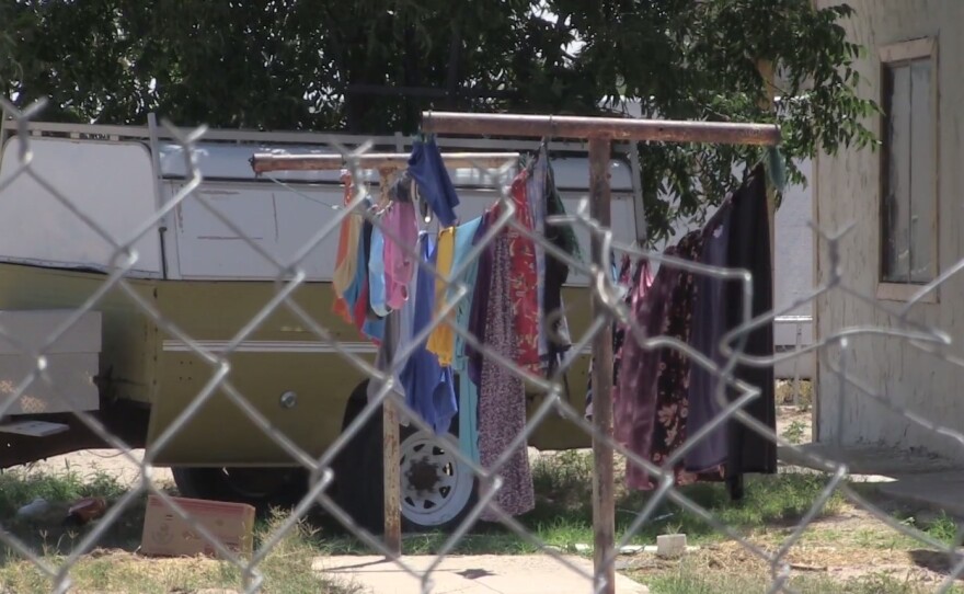 A clothes line in a backyard in a colonia in Texas near the U.S.-Mexico border is shown in this undated photo.