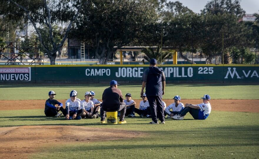 After practice coaches and players front the Tijuana Little League all-star team talk about the Mexican National Little League tournament coming up, and how they hope to win and represent their country in the Little League World Series, Tijuana, June 15, 2023.