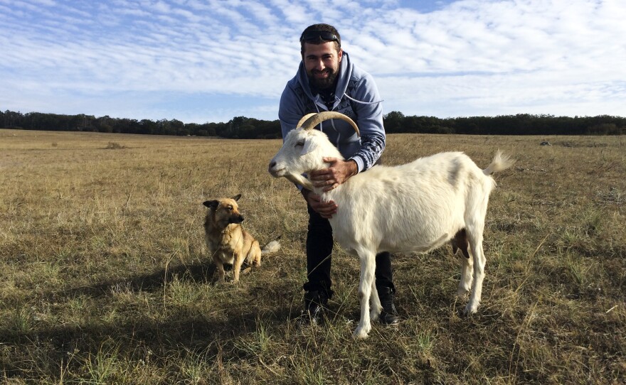 Ernes Ayserezli, 26, runs a goat farm with his father.