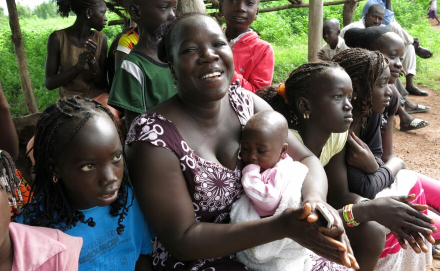 Mariama Keita holds her 4-month-old daughter, Ndeye.