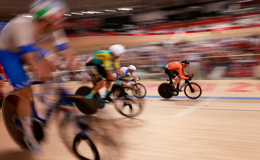Netherlands' Jan Willem Van Schip, right, competes in the men's track cycling omnium points race during the Tokyo 2020 Olympic Games at Izu Velodrome in Izu, Japan, on August 5.