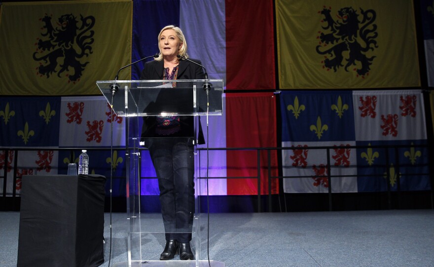 French far-right National Front party leader Marine Le Pen makes a statement after her party lost the second round of France's regional elections on December 13, 2015, in Henin-Beaumont, France. The party achieved record gains in the first round.