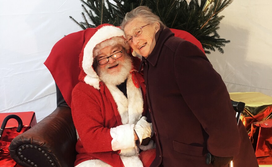 Haley and Andree Boursier, 88, pose for photos. She says she still believes in Pere Noel.