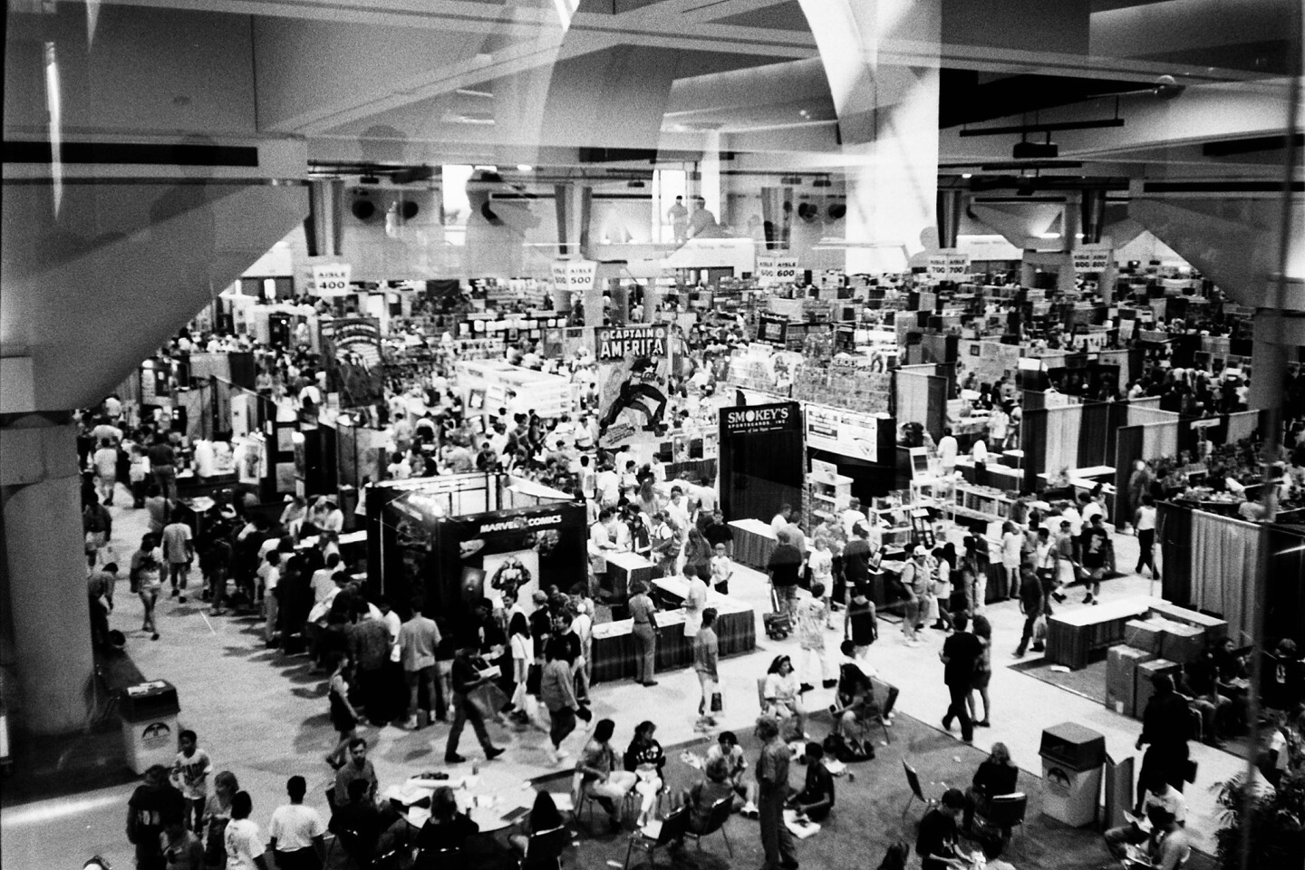 Attendees explore Halls A and B in this photo taken from the Mezzanine floor at the 1992 Comic-Con Convention.