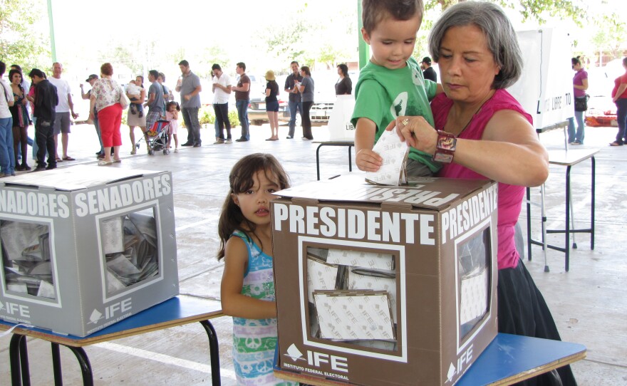 Patricia Terrazas casts her ballot for the Mexican presidential election in Ciudad Juárez. She is both a Mexican citizen and a U.S. resident who lives and works in El Paso, Texas.
