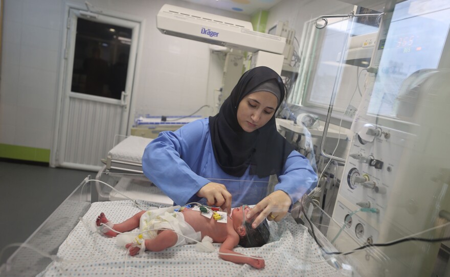 This newborn at Gaza's Nasser Hospital was delivered after their mother was killed in an Israeli airstrike on Oct. 24. The doctor said the baby is now in stable condition.