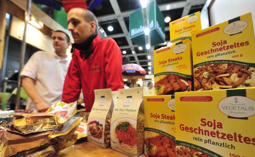 Fair workers at a vegetarian stand sell meatless items at the "Bio" (organic food) section of the International Green Week Food and Agriculture Fair in Berlin in 2011. Germany's minister of agriculture has called for a ban on using meaty words like "schnitzel" and "würst" to market such products.