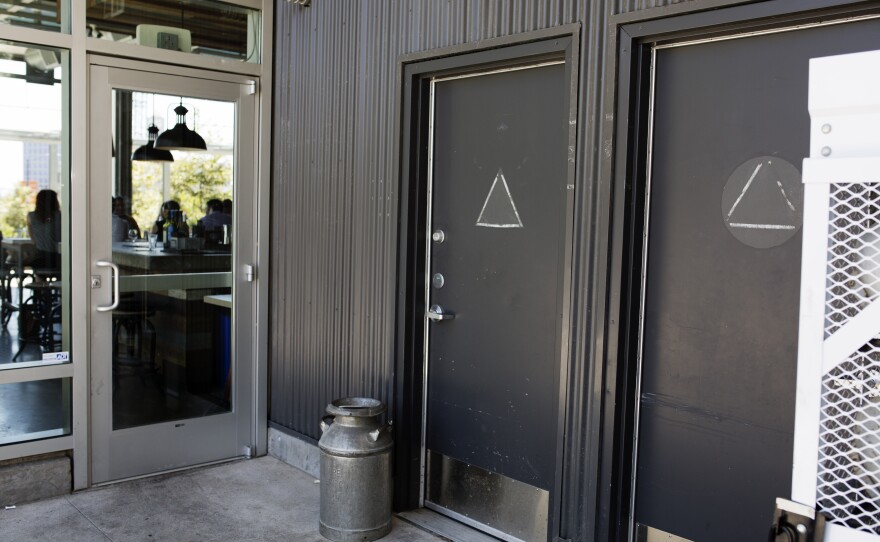 The closed restrooms outside of Stella Public House at Fault Line Park, August 23, 2016.