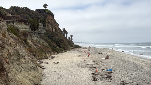 Traffic cones mark off an area at San Elijo State Beach where active bluff failure is occurring, July 9, 2026.