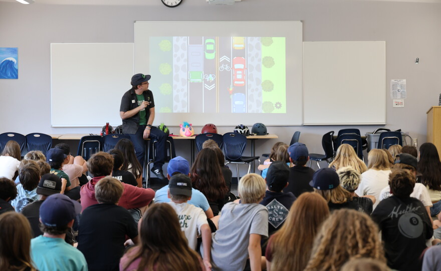 Kevin Baross, the San Diego County Bike Coalition's education manager, leads a bike safety presentation at Oak Crest Middle School in Encinitas on Aug. 17, 2026.