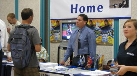 A veteran gets information at a booth at the the "Welcome Home" event in La Jolla. With a new GI Bill in effect, many veterans attended the event to get answers of their new benefits.