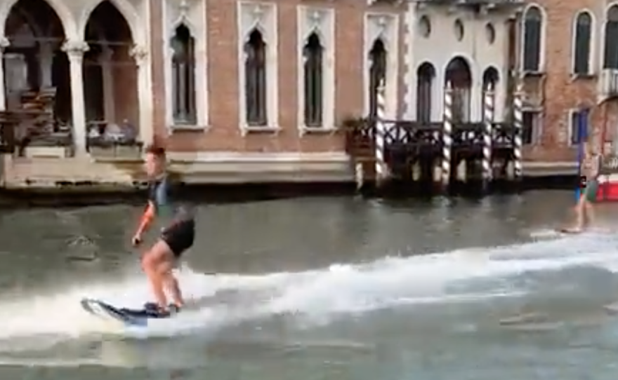 The mayor of Venice, Italy, mobilized a search for two people who used motorized surfboards to cruise down the picturesque city's canals. Now the pair are facing large fines.