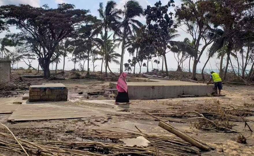 In this photo taken on Jan. 20, a beach resort in Tonga, on the outskirts of the capital of Nuku'alofa, shows the impact of the tsunami that hit the island nation in the wake of an underwater volcanic eruption. Aid efforts have been complicated by the pandemic — with only one case of COVID on record, Tonga is wary of outsiders who might bring the virus.