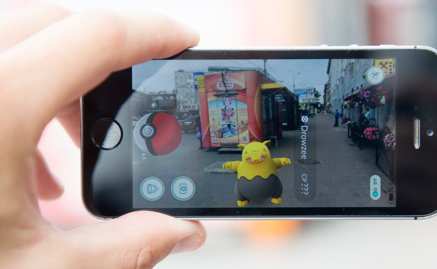 The Pokémon Go location-based mobile game running on a smartphone in Russia.
