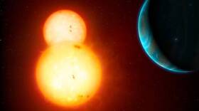 This illustration shows a planetary system orbitting two sun-like stars. 