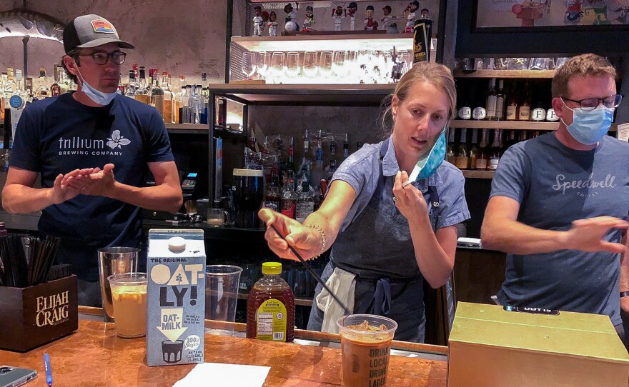 Lauren Moran, a pastry chef who owns a bakery and café, taste-tests Cornwall's new coffee drinks with her husband, Cornwall's general manager Billy Moran (left), and Speedwell Coffee Co. owner Derek Anderson.