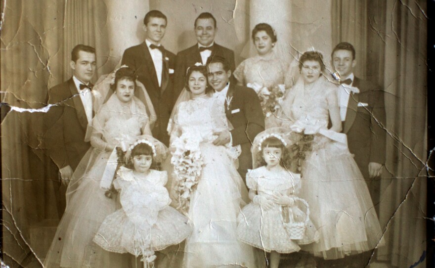 Genoveva and Juan Bonet are seen on their wedding day. Her family has deep roots in Puerto Rico, and she says she doesn't want to leave, but thinks she may eventually have to join her daughter in central Florida.