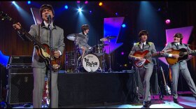 The Fab Four performs a Beatles tribute on stage at Pechanga Resort & Casino Theater on January 6, 2012.