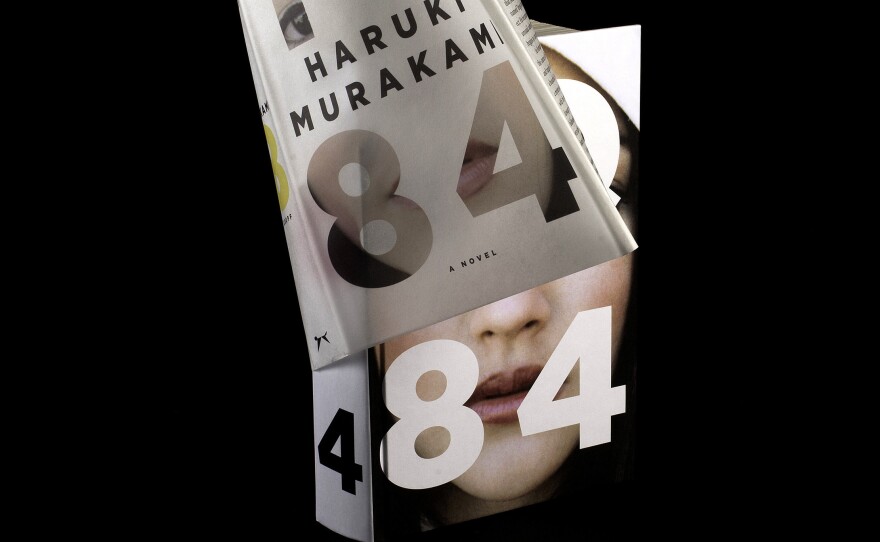 Designed by Chip Kidd, the book jacket for Haruki Murakami's 1Q84, when removed, reveals a woman's face.