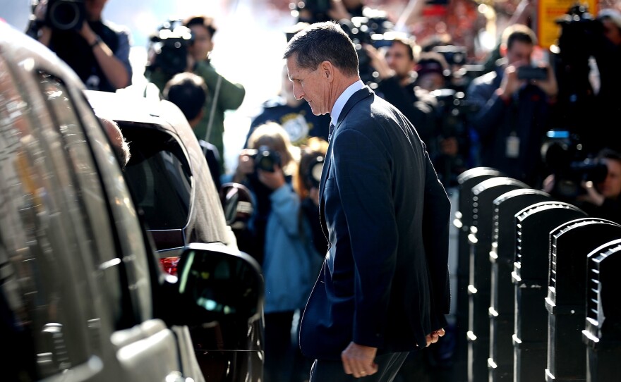 Michael Flynn, former national security adviser to President Trump, leaves following his plea hearing at the Prettyman Federal Courthouse in Washington, D.C., last December. Sentencing documents indicate he has been helpful to the ongoing special counsel investigation.