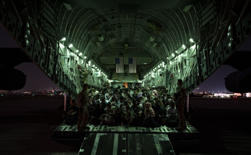 The U.S. withdrawal from Afghanistan, which saw scenes of desperation and violence inside and outside of Kabul's airport, has coincided with a drop in President Biden's approval rating. Biden has fiercely defended the evacuation.