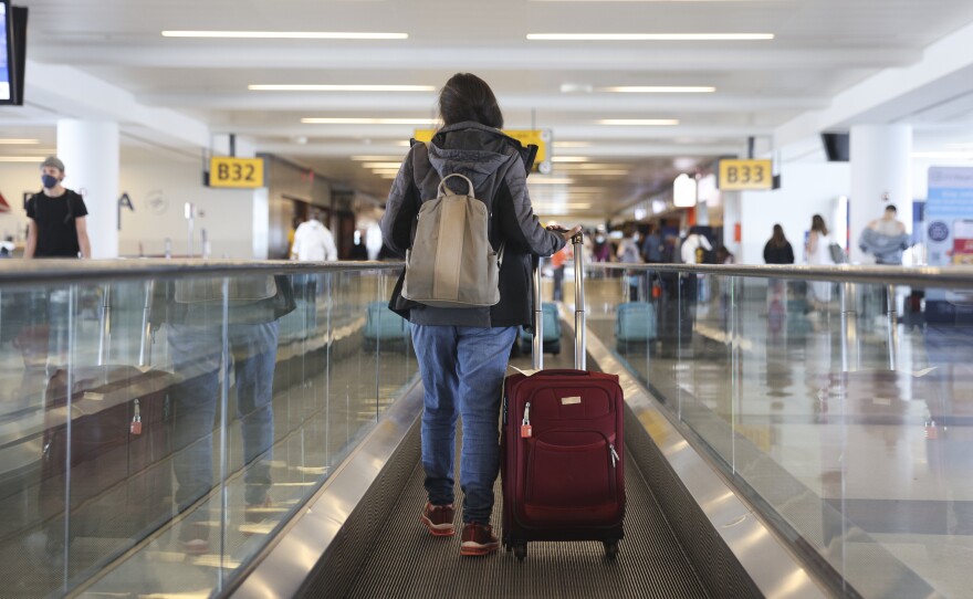 The Centers for Disease Control and Prevention updated its domestic travel guidance for fully vaccinated people on Friday, lifting certain requirements while continuing to advise mitigation measures like mask wearing and hand washing.