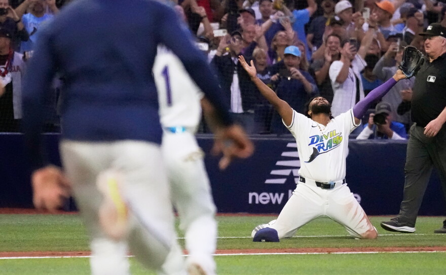 Tampa Bay Rays third baseman Junior Caminero celebrates their win against the Cleveland Guardians in Game 6 of an American League Championship Series baseball game in St. Petersburg, Fla. Monday, Oct. 19, 2026.