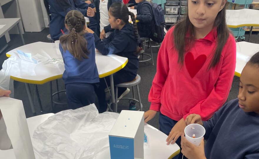 Third-grade students at Feaster Charter School work on their handmade seismographs, Tuesday, before joining the collective jump experiment sponsored by the Fleet Science Center, Chula Vista, Calif., December 5, 2023