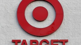 This Dec. 19, 2013, file photo shows a Target retail chain logo on the exterior of a Target store in Watertown, Mass. 