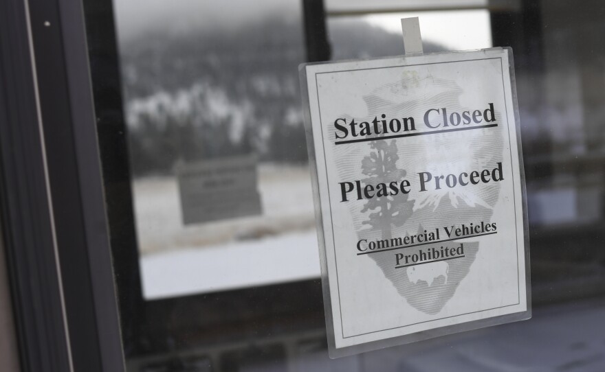 A pay station at Rocky Mountain National Park is closed on Thursday in Estes Park, Colo. Many parks remain open but unstaffed during the partial shutdown of the federal government.