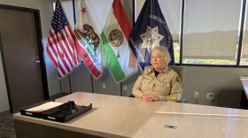 Sheriff Kelly Martinez sits behind her office desk at the San Diego County Sheriff's headquarters on Dec. 5, 2023.