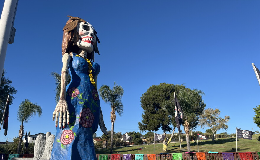 A Catrina and other Dia de los Muertos decorations cover part of La Vista Memorial Park, Oct. 26, 2026.