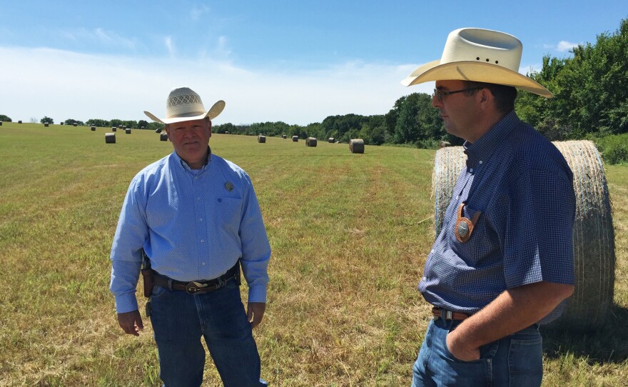 John Cummings (left) and Bart Perrieron are "cowboy cops" — they're special rangers with the Texas & Southwestern Cattle Raisers Association, which investigates agricultural crimes in Texas and Oklahoma. Cummings says cattle rustling is a crime with "low risk, high reward, really."