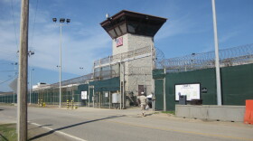 An October 2010 photo reviewed by U.S. military officials shows Camp VI entrance at Guantanamo, where 70 prisoners were detained.