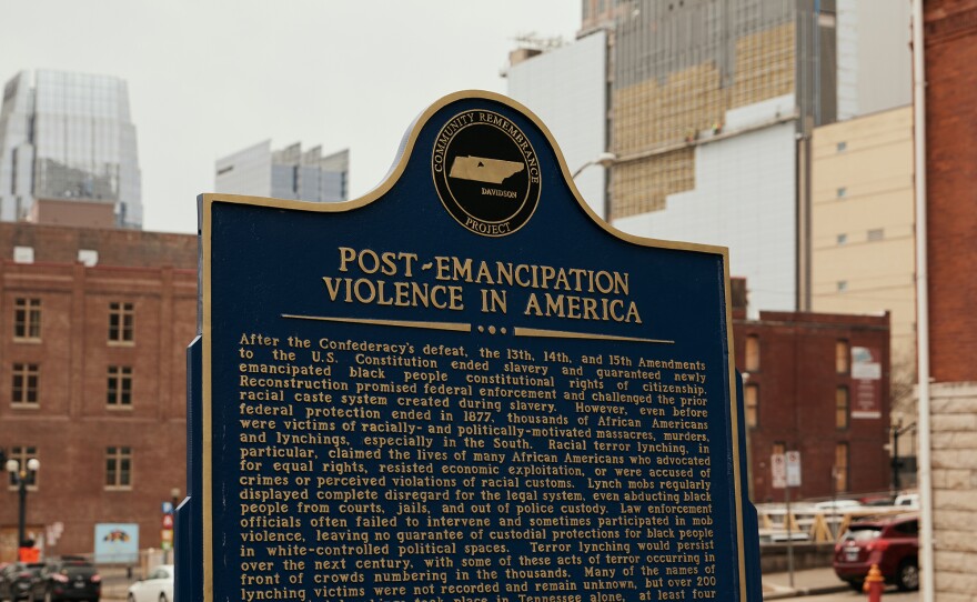 A community remembrance project marker notes lynchings and other acts of terror that were inflicted upon Black people in Nashville after the end of the Civil War.