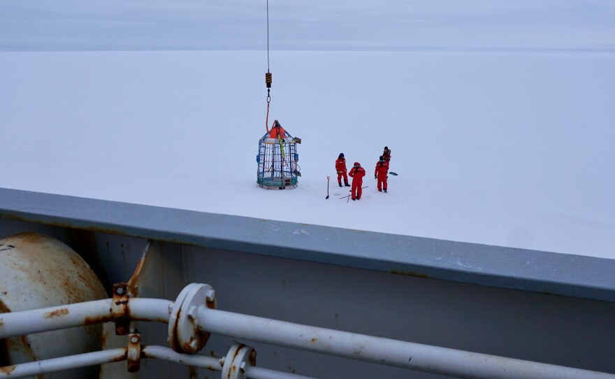 Members of the MOSAiC team also took manual ice thickness measurements using a drill.